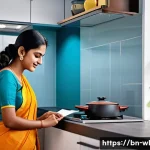 Home 20 스마트 주방 기기의 안전 기준 - A modern Bengali kitchen featuring smart appliances such as a smart stove with automatic shutdown, a...